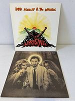 Front covers of both albums