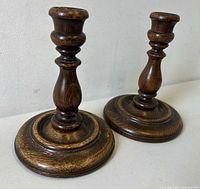 pair of oak candle holders front view