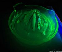 Reamer glowing under UV light showing uranium content