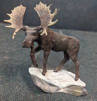 Front angled view of resin moose on crystal base