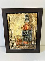Full view of framed Jack Daniels painting