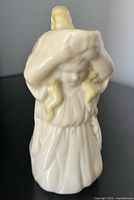 Front view showing figure and glaze