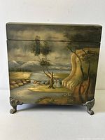 front view showing painting and feet