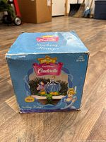 Front view of retail box showing product image and Disney branding