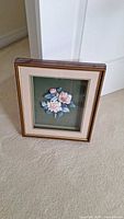 Framed floral artwork front view