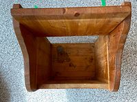 Top-down view of interior showing wood and mesh construction