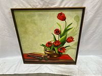 Framed view of signed canvas painting