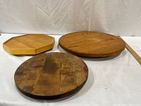 Group shot of all three wooden rotating trays