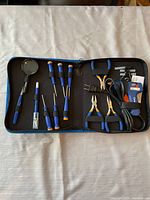 open tool kit showing contents in case