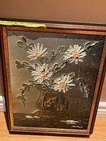 Full view of framed floral painting signed Moustache