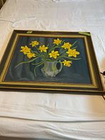 Full view of framed painting showing flowers and frame