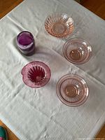 All five glass pieces on table
