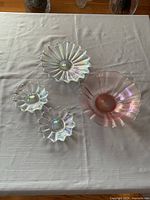 All four glass pieces on tablecloth for scale and grouping