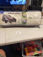 Full carry bag showing Napier Backroadz branding and tent inside