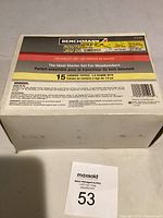 Outer cardboard box showing Benchmark branding and specifications