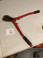 Full view of bolt cutters on table