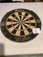 Full view of Nodor Swiftflyte bristle dartboard showing scoring rings and numbers