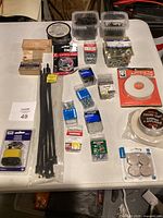 overview of all packaged fasteners and accessories on table