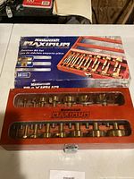 Set in wooden case and box showing branding and contents