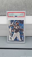 Front view of PSA-graded Luis Robert 2020 Topps #392 card in slab