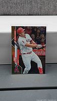 Front view of 2020 Topps Mike Trout Active Leaders Gold Foil card in sleeve