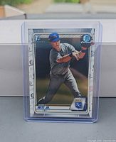 Front view of Bobby Witt Jr. 2020 Bowman Chrome 1st Bowman card in plastic top loader