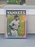 Front of Aaron Judge 2021 Topps Chrome Refractor card in sleeve and top loader