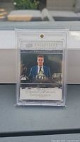 Front of Connor McDavid Exquisite Moments card in protective holder