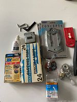 All items spread out showing variety of tools and hardware