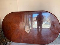 Cherry wood dining table top with center leaf sections, reflective finish