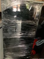 Front view of wrapped glass display cabinet