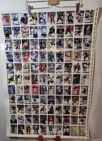 Front of uncut sheet showing full grid of player card fronts