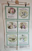 Full uncut panel front showing six illustrated blocks and title Three Little Kittens