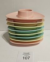 Stack of seven pastel melamine egg cups