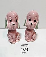 Front view of both pink puppy shakers