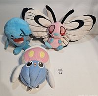 Front view of all three plush toys