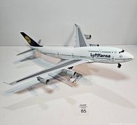Left front quarter view of Lufthansa 747 model showing livery and landing gear