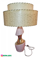 Front view of full lamp showing base and shade