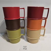 Six stacked mugs showing colour variety