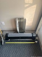 Front view of both heaters showing overall condition and size