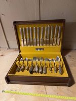 Open chest showing entire flatware set