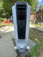 Front view showing digital control panel, casters and general condition