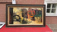 Front view of framed oil painting