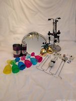 Full lot showing cups, tumblers, tray, shaker, dispenser, pineapple cups, shot glasses, wine glass holder