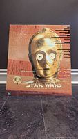 Front of boxed set showing C-3PO artwork and title