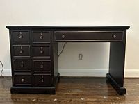 Front view of espresso computer desk showing cabinet side and keyboard drawer