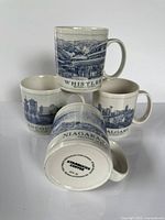 All four Starbucks mugs stacked to show city names