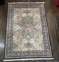 Full view of carpet showing field, border and fringe