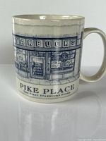 Front view showing Starbucks Pike Place storefront graphic and mug shape