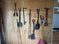 All tools hung on wall, full view